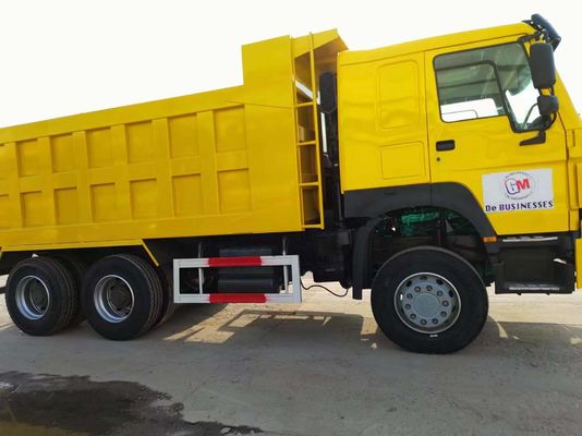 Tipo di trasmissione manuale Sinotruk HOWO Camione a scarico 10 ruote Camione a ribaltamento giallo